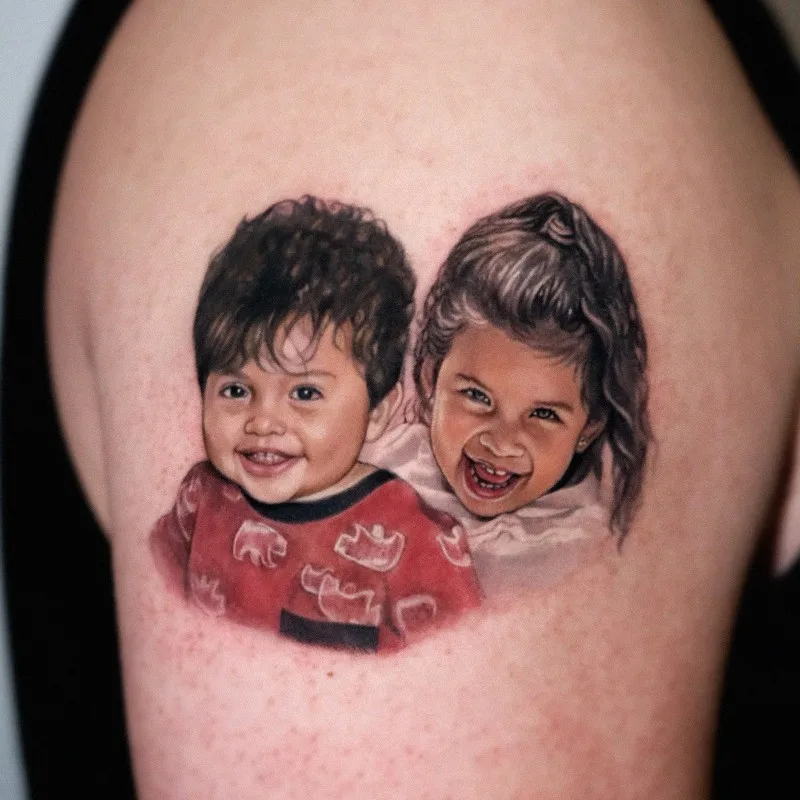 boy and girl portrait tattoo by Elly