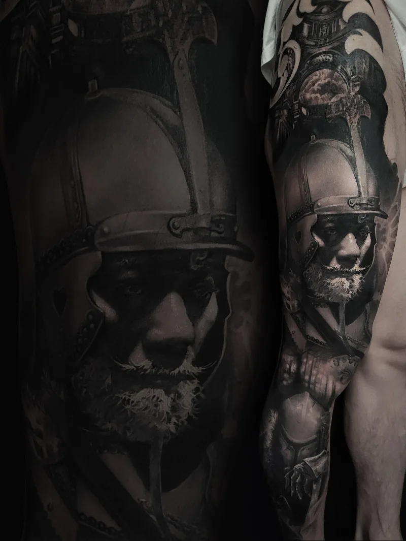 Knight leg sleeve black and grey tattoo done by Shang Qi Liu