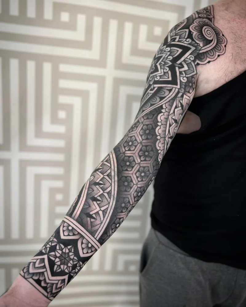 Ornamental Black and Grey Tattoo Sleeve done by Jack Peppiette