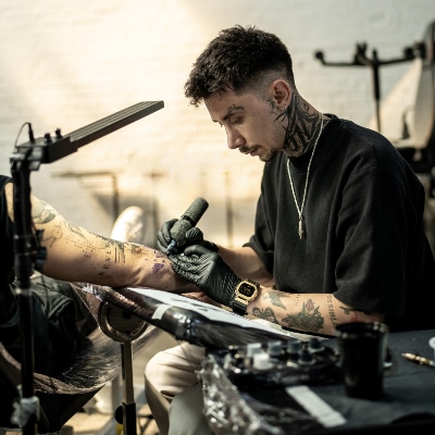 Tolga Temirlenk • Timeless Balance: Black & Grey Tattooing Built to Age with the Body